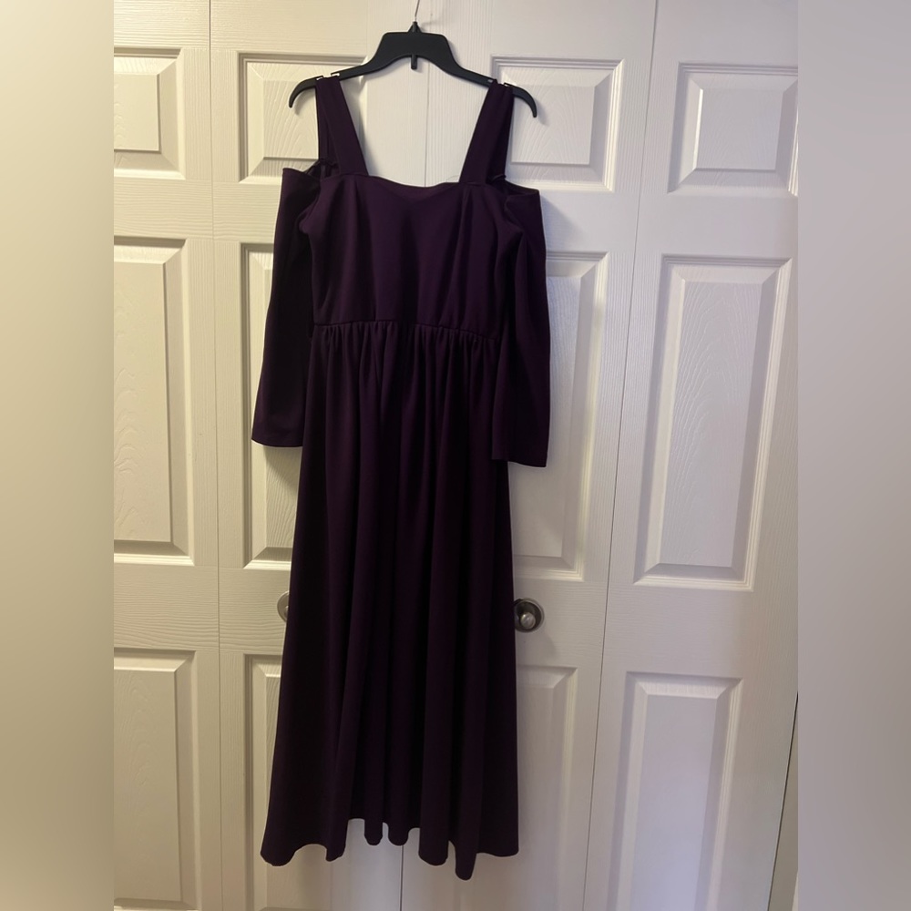 A long purple dress for fall is a stylish choice.